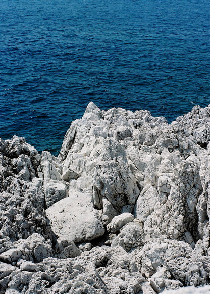 WHITE ROCKS ON BLUE OCEAN