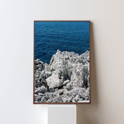 WHITE ROCKS ON BLUE OCEAN